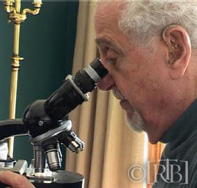 On 20 April 2004, Dr. Frederic Zugibe examining the cardiac sample under microscope in New York