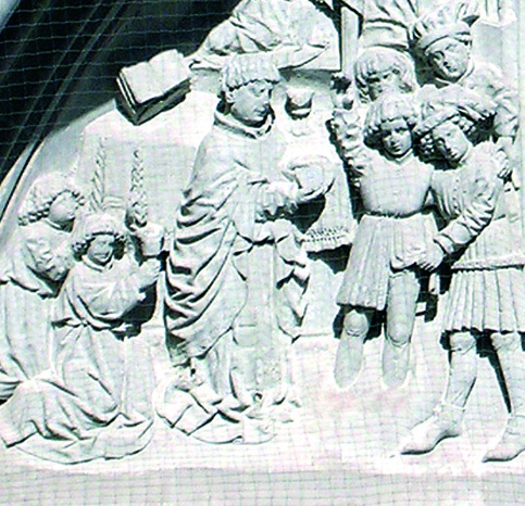 Representation of the Miracle of Seefeld. Detail of the Gothic gable, Church of St. Oswald (1470)