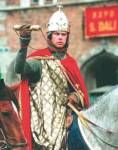 A knight pretending to be the Count of Flanders bringing back the Most Precious Blood