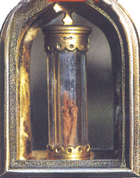 A 17th century display case containing the cloth stained with blood, preserved in a crystal tube.