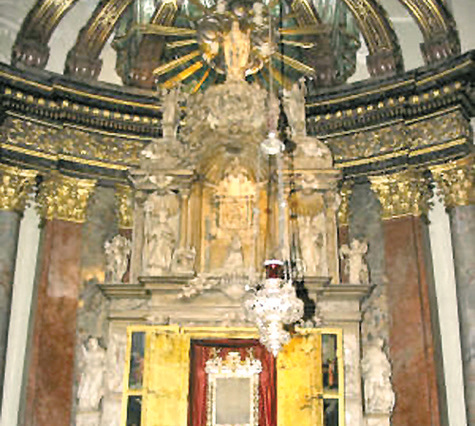 Father Augustine presents the Miraculous Corporal to pilgrims