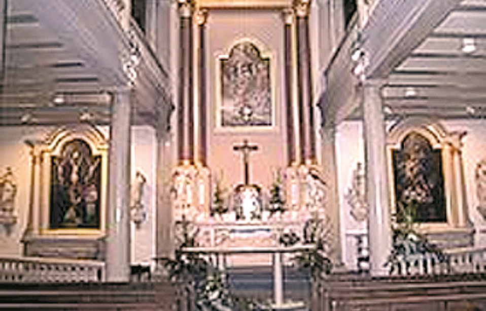 before the reliquary of the Nun of the Order miraculous Host (1484) of Beghine Chapel of the Blessed Sacrament