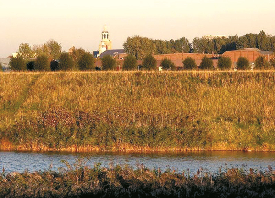 View of the Schelda River The church of Saints Peter and Paul and the River Schelda