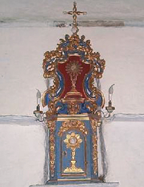 Corpus Christi. Father Reinardi then placed the Sacrament in the monstrance. He processed