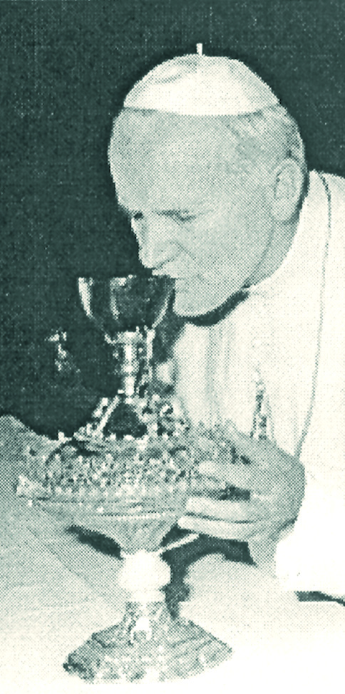 John Paul 11 kisses the Holy Grail of Valencia